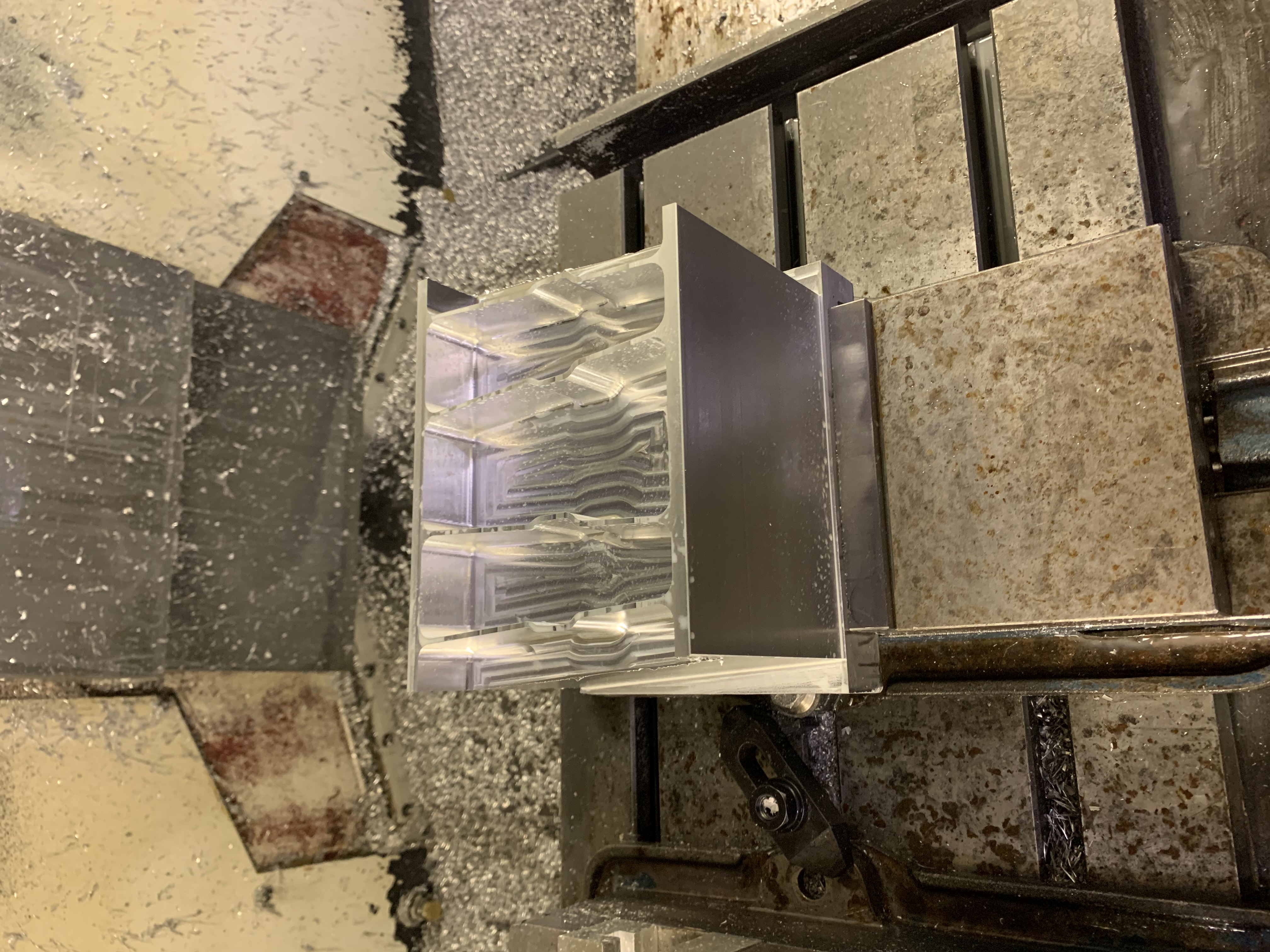 CNC milling machine working on metal component